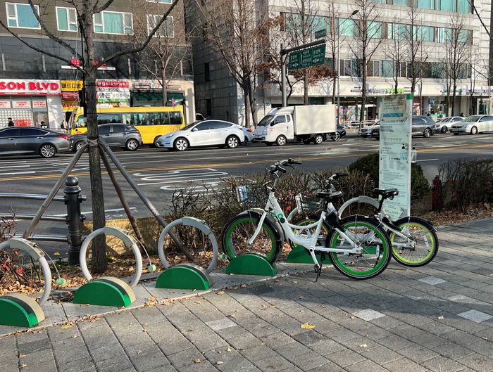 Seoul Bike share bicycles in their docks on a Seoul street